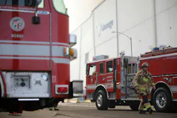 A Los Angeles Fire Department rig sits at a recent warehouse fire.