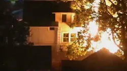 Police Officer Pulls Two from Overnight House Fire in Minneapolis
