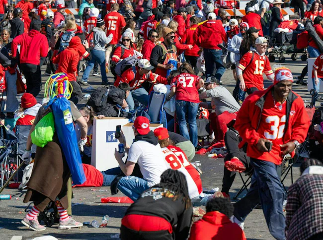 Fans scatter during a shooting at a parade after the Chiefs won the Super Bowl.