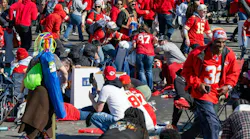 Fans scatter during a shooting at a parade after the Chiefs won the Super Bowl.