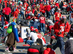 Fans scatter during a shooting at a parade after the Chiefs won the Super Bowl.