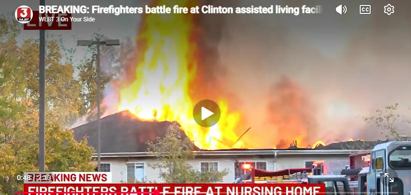 Some residents sitting in wheelchairs watched the firefighters battle the flames.
