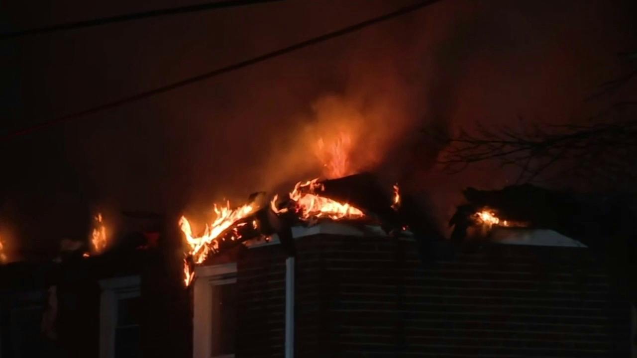 Detroit Firefighters Rescue Two from Apartment Building Fire