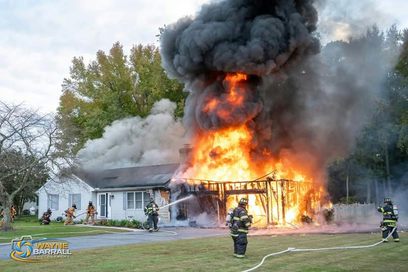 The five cats inside the house were found OK by firefighters.